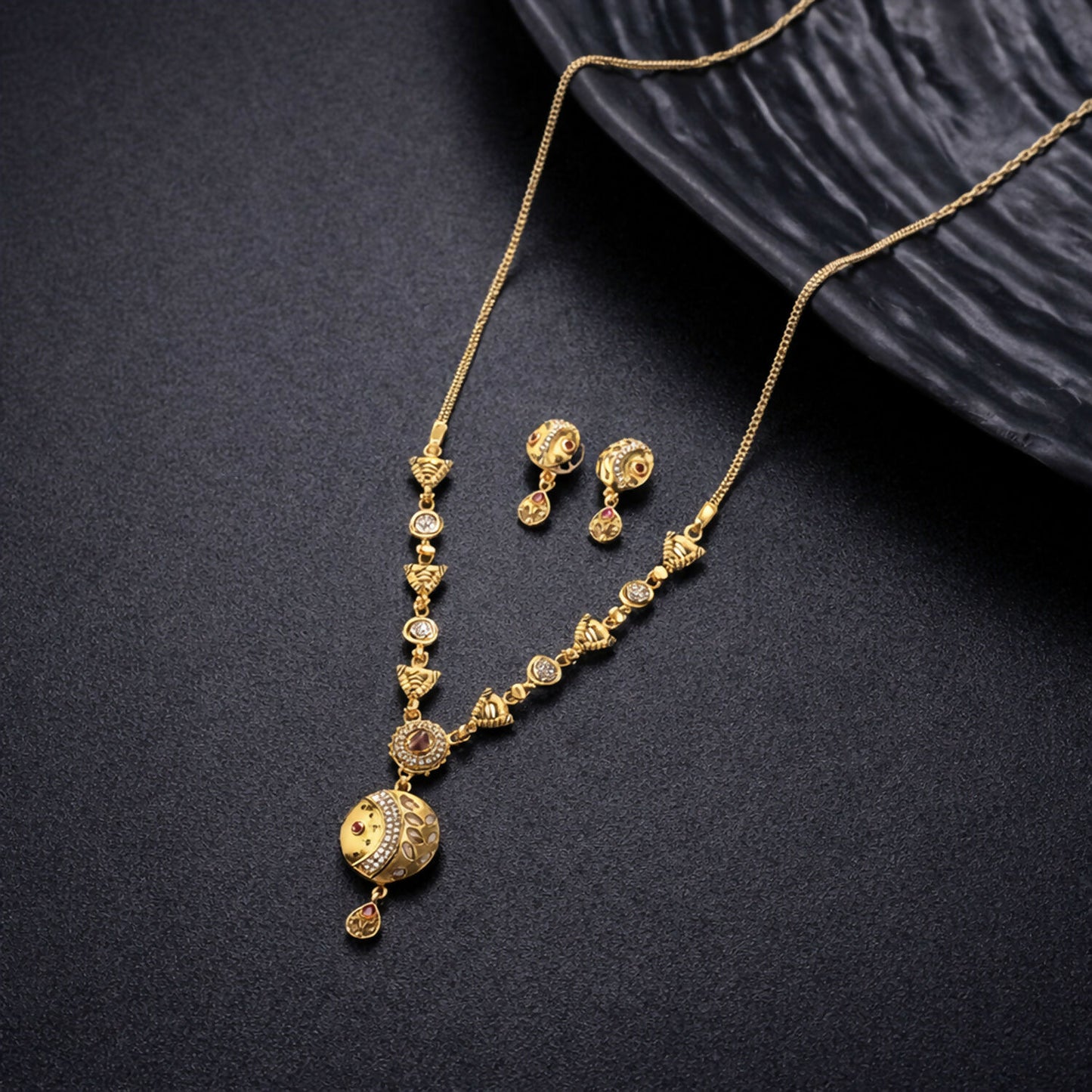 Traditional gold-tone beaded necklace with pendant and matching earrings for special occasions