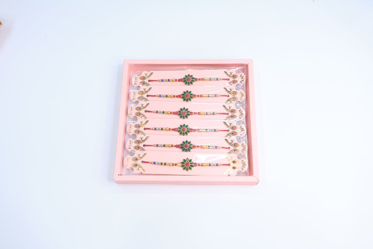 12 Pc Floral Stone Rakhi Set with Green & Pink Enamel Work and Multicolor Beads – Traditional Designer Rakhi Gift Box for Raksha Bandhan