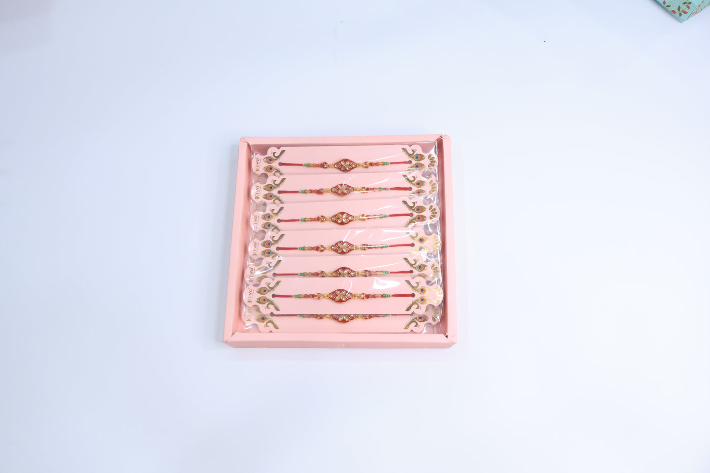 12 Pc Kundan Floral Rakhi Set with Red Enamel Work and Multicolor Beads – Traditional Designer Rakhi Gift Box for Raksha Bandhan