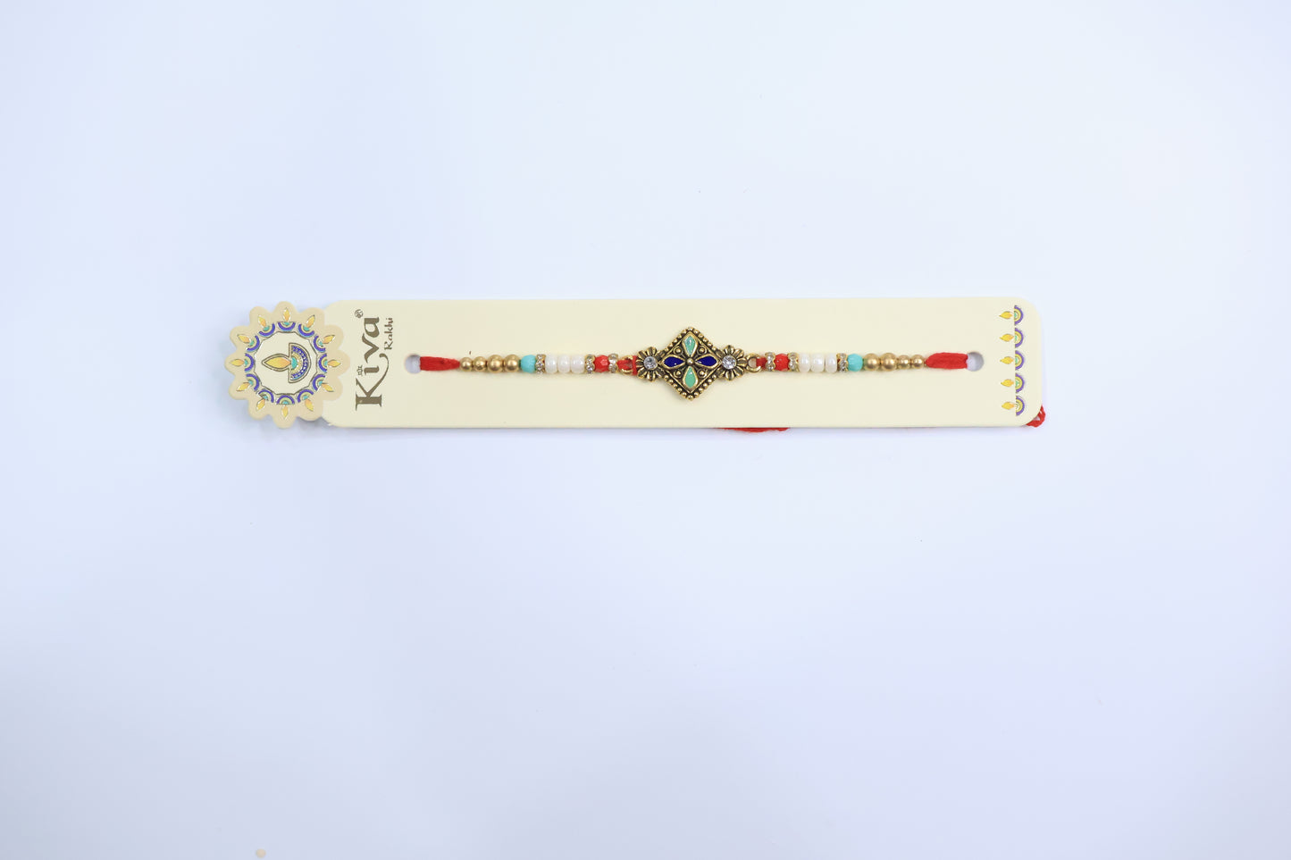 Ethnic Square Dial Rakhi with Multicolor Enamel Work and Decorative Beaded Thread