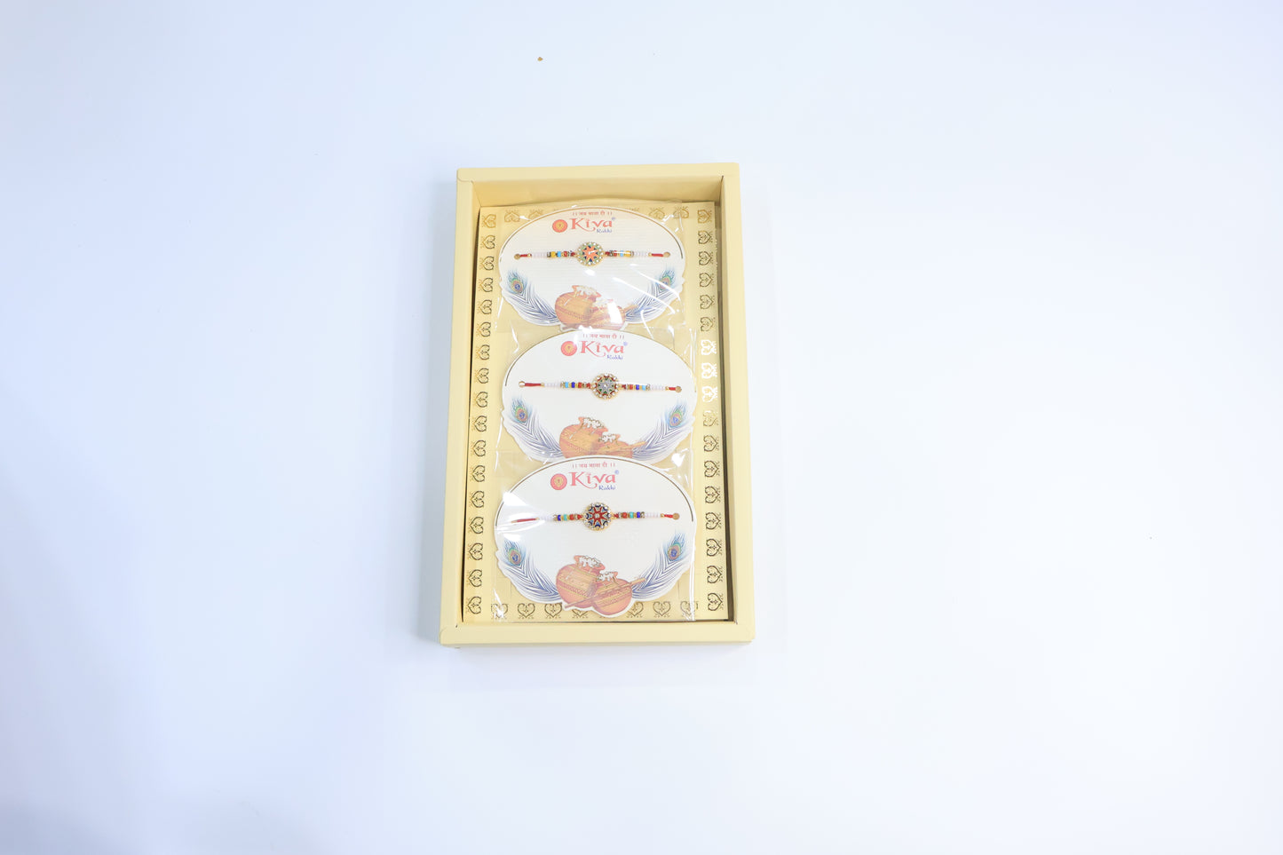 12 Pc Set – Designer Star Motif Rakhi with Multicolor Beads and Stone-Studded Golden Center