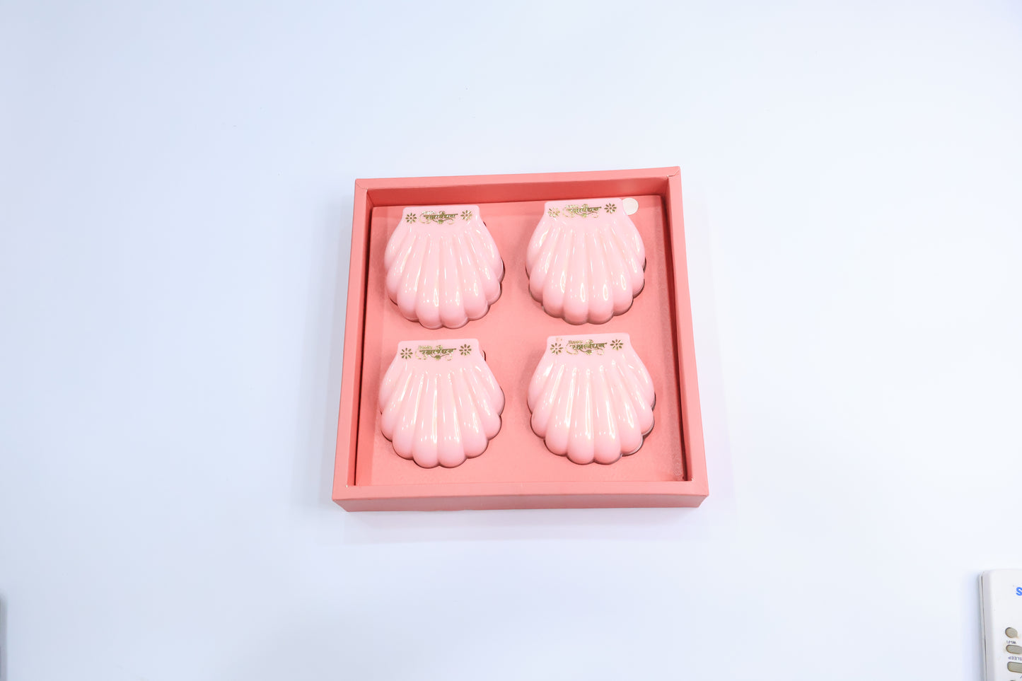 4 Pc Om Rakhi Set with Gold-Plated Dial, Pink & Red Beads – Premium Designer Gift Box for Raksha Bandhan
