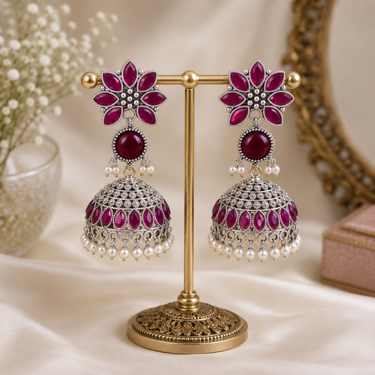 Side angle showing intricate craftsmanship of oxidized silver Jhumkha earrings