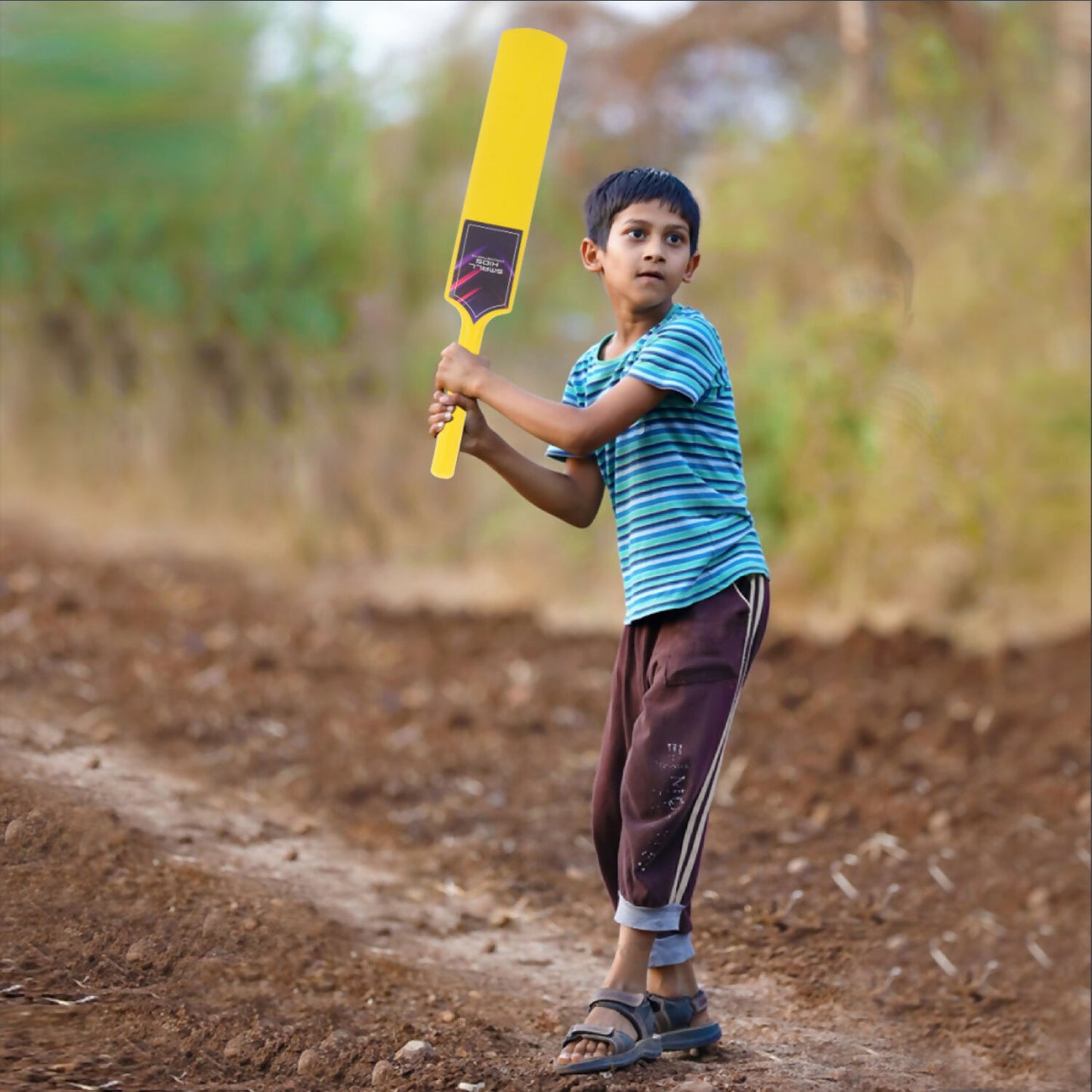 Side view of Aditi cricket bat with grip for kids