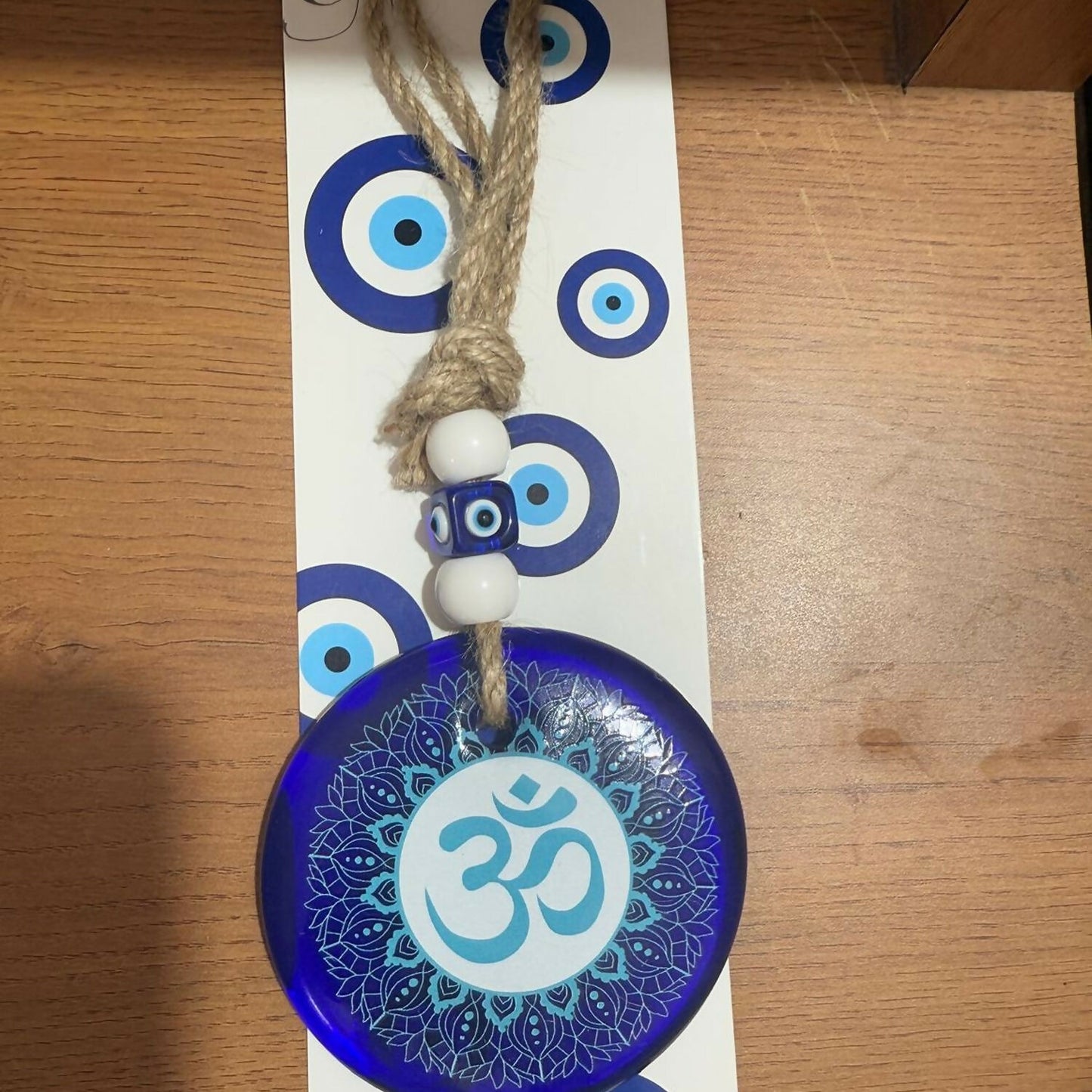 Decorative Blue Glass Wall Hanging with Om Symbol & Evil Eye Beads – Spiritual Protection, Meditation & Positive Energy Décor for Home, Office, Car & Gift Purpose