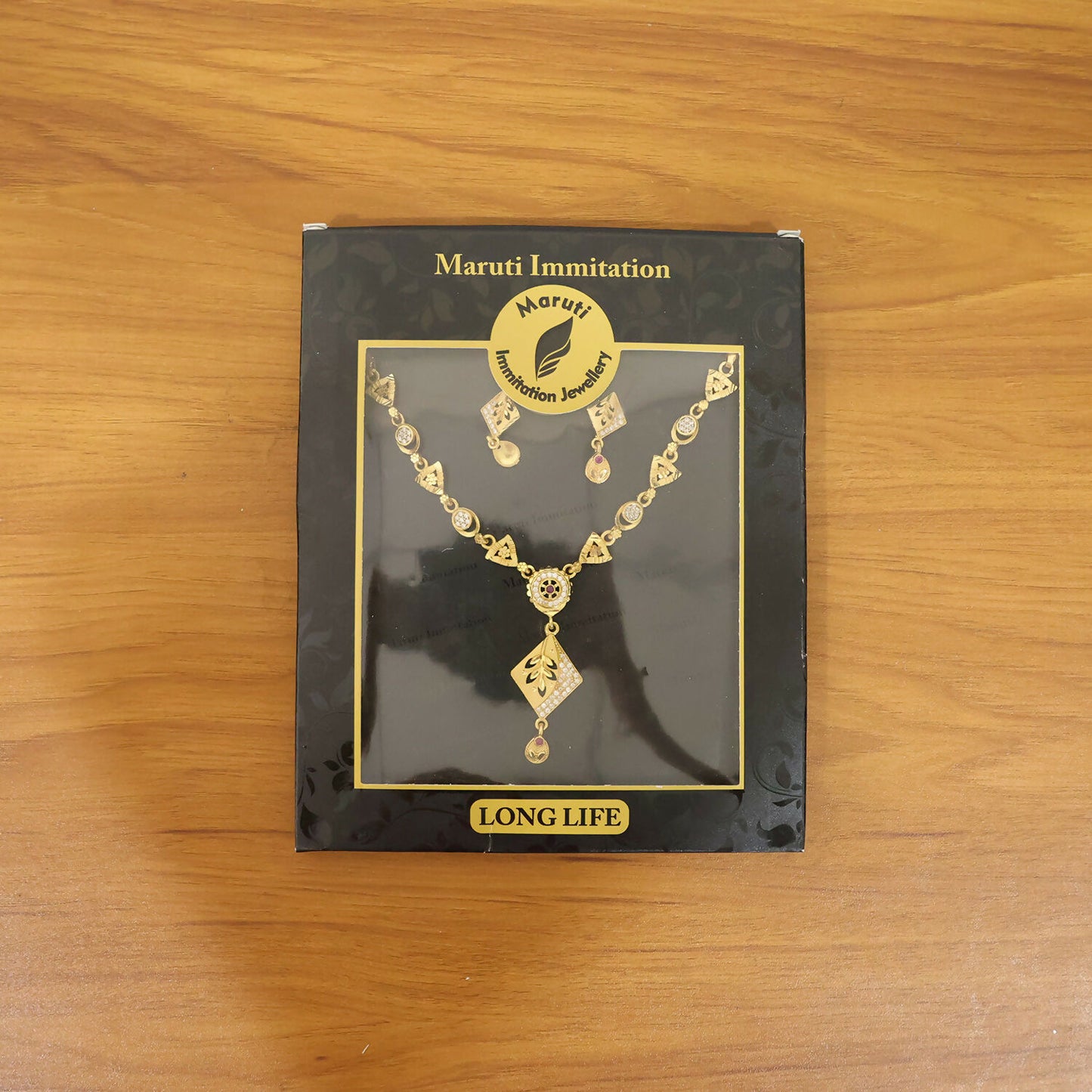 Jewelry set featuring gold plating and sparkling stones, perfect for weddings