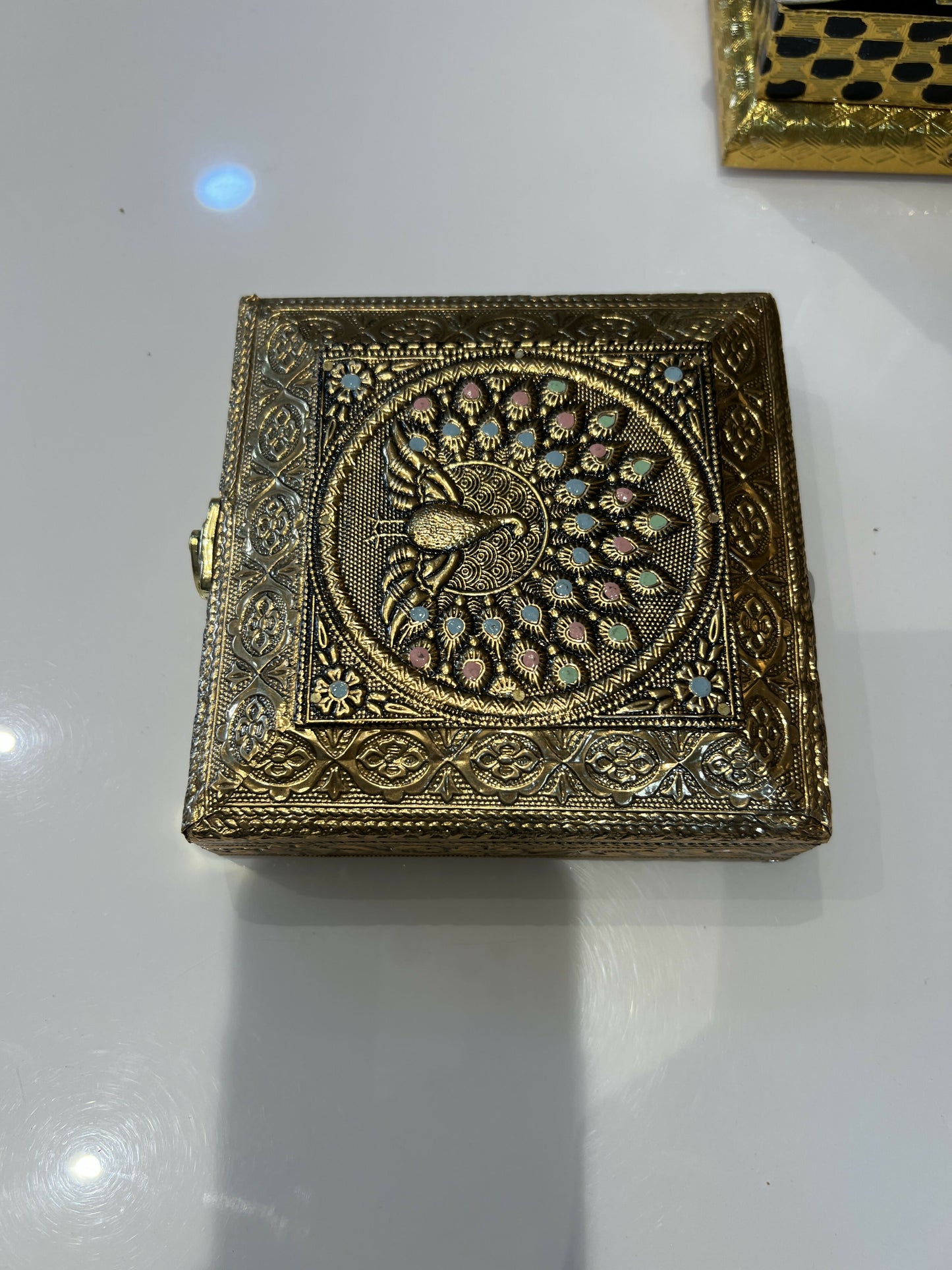 Handcrafted antique style brass peacock jewelry box in elegant setting