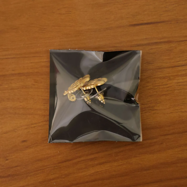 Floral Inspired Gold Stud Earrings With Central Stone And Teardrop Dangle Detail