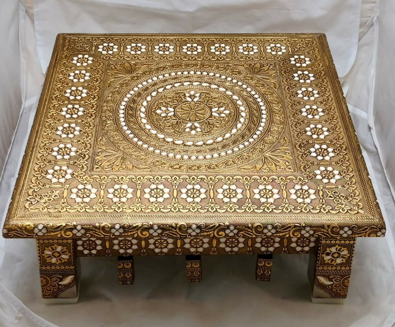 Another perspective of the handcrafted Pooja Chowki, emphasizing its traditional Indian artistry.