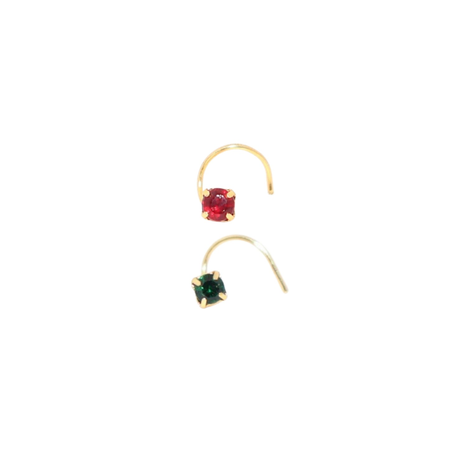 Close-up of gold plated nose pin featuring emerald green crystal