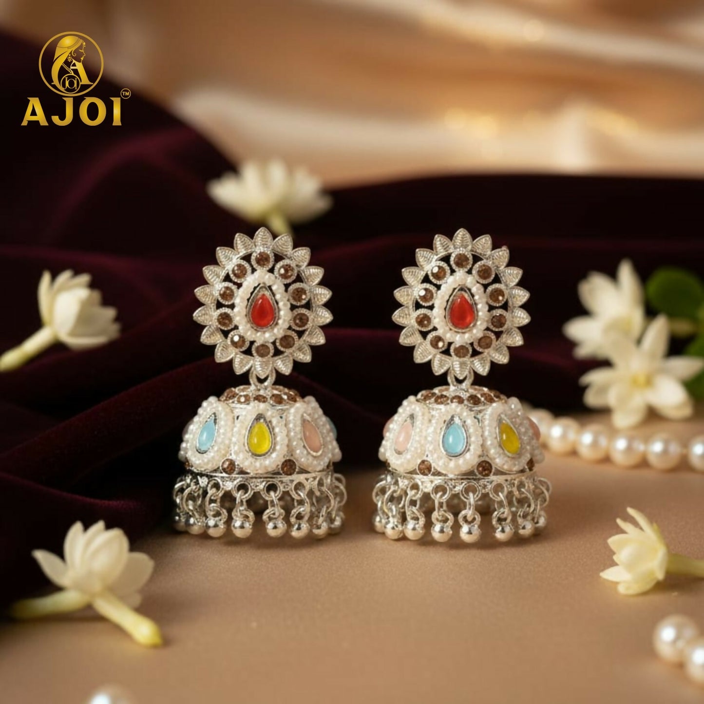 Royal Silver-Tone Kundan Jhumka Earrings with Multicolor Stone Inlay & Pearl Drop Detailing