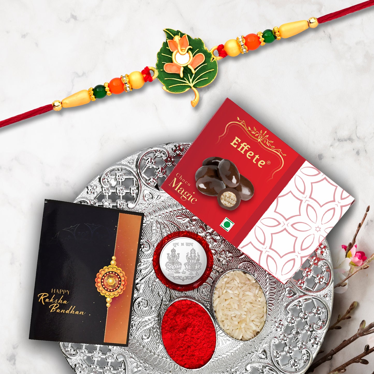 Ganesh Rakhi Combo Gift Set displaying rakhi and puja thali essentials