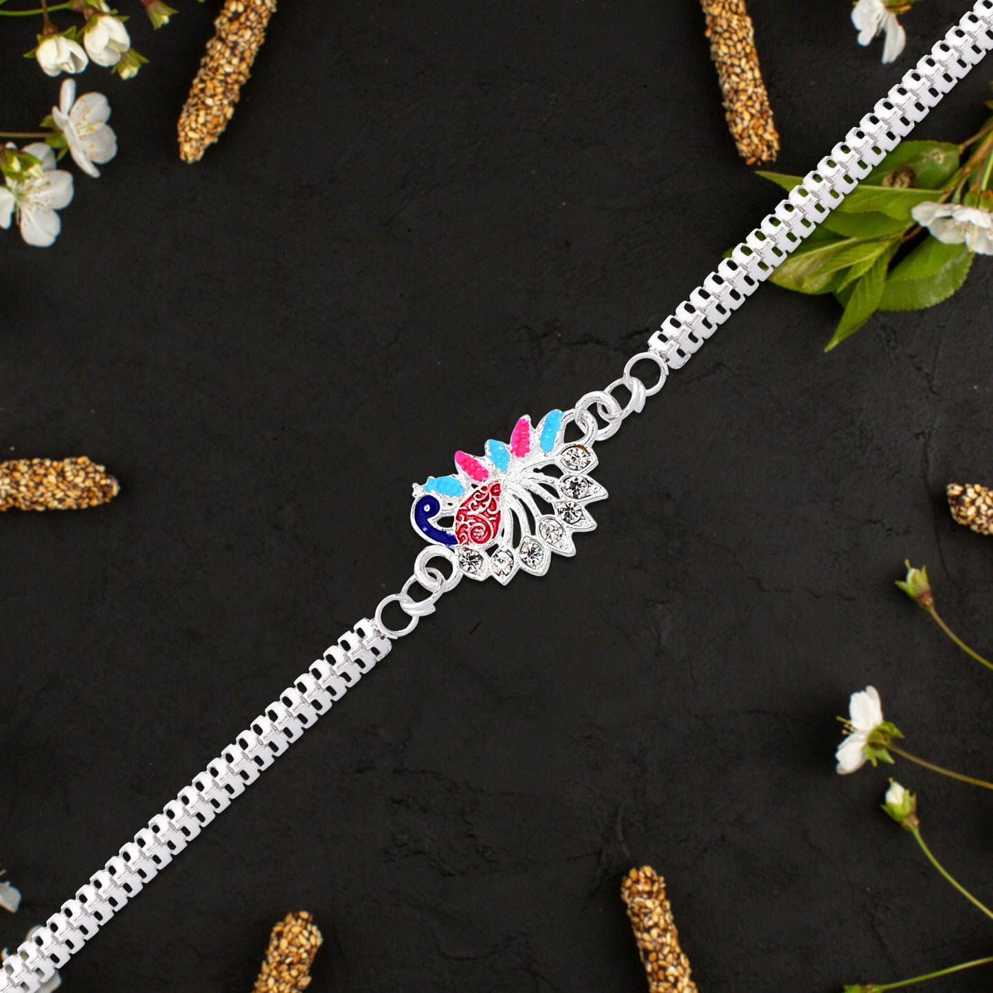 Colorful Peacock Design Rakhi with Enamel Finish and Silver-Tone Metal Chain