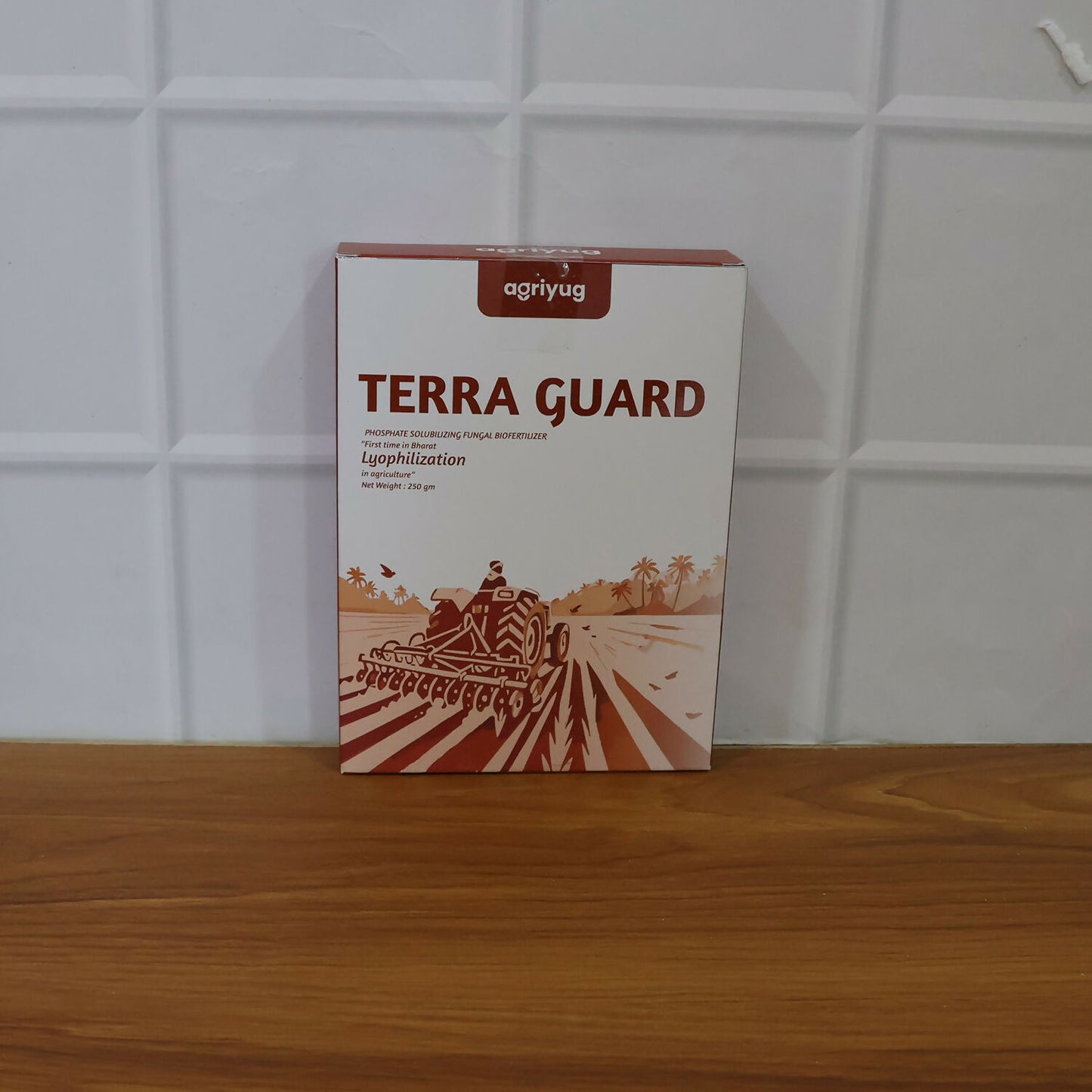 Farmer applying Terra Guard solution in the field