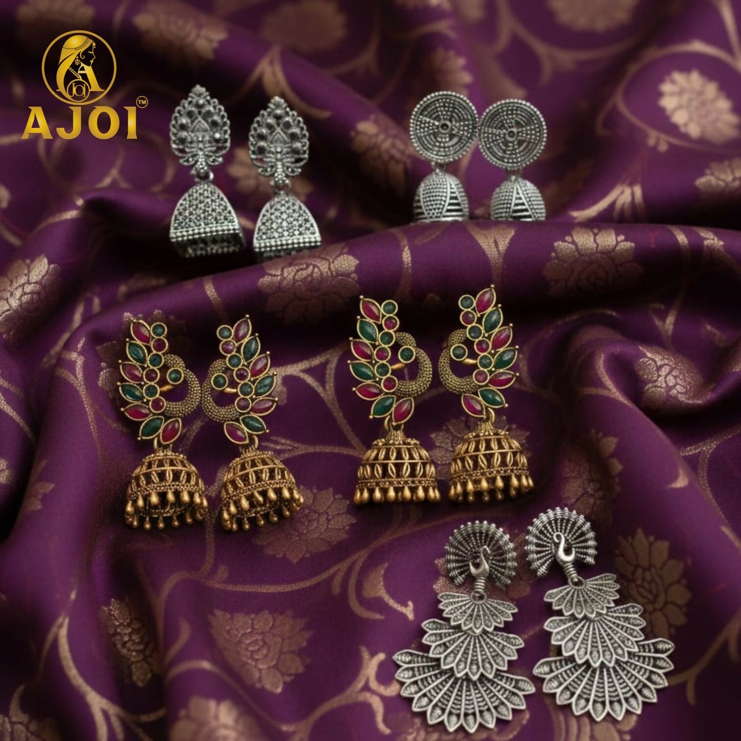 Elegant stone-accented peacock temple earrings in antique gold and oxidized silver finish