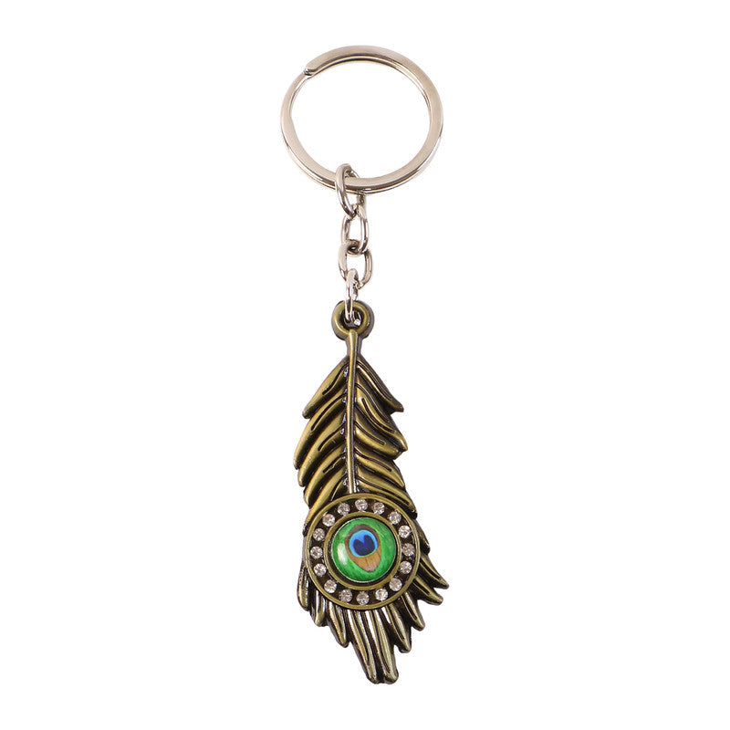 Krishna Mor Pankh Metal Keychain – Peacock Feather with Stone Work
