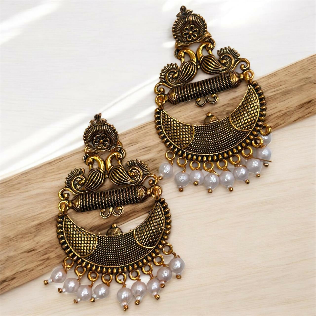 Antique Gold Tribal Chandbali Earrings with Pearl Drops & Peacock Motif
