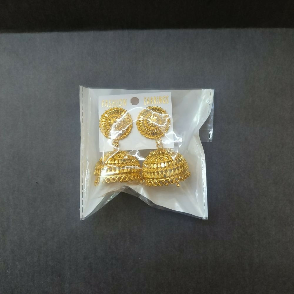 Gold jhumka earrings with ornate detailing on display