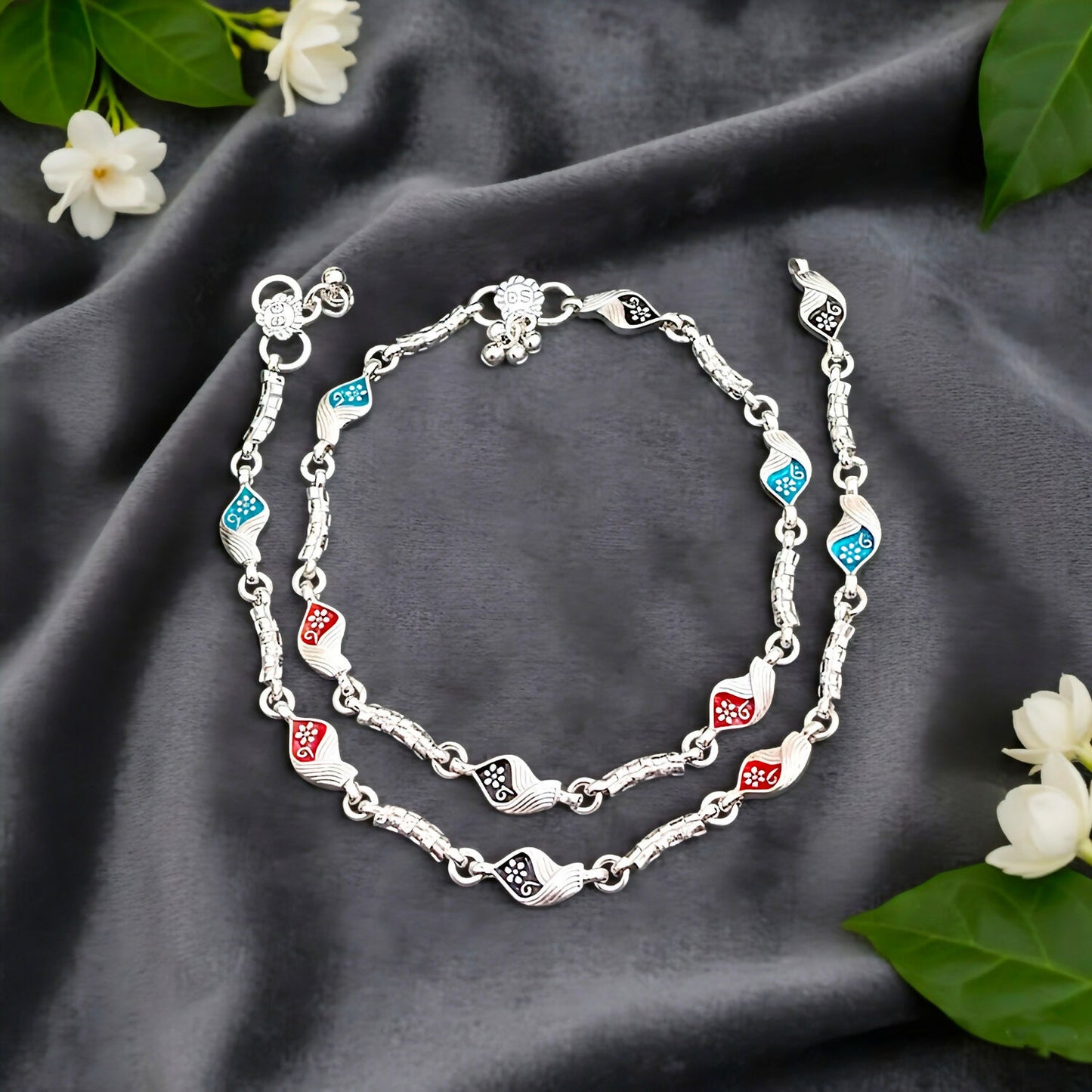 Intricate leaf/floral patterns featuring vibrant red, navy blue, and black enamel anklet ( payal )