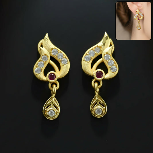 Classic Gold Tone Designer Leaf Earrings With Ruby Accent And Graceful Hanging Drop