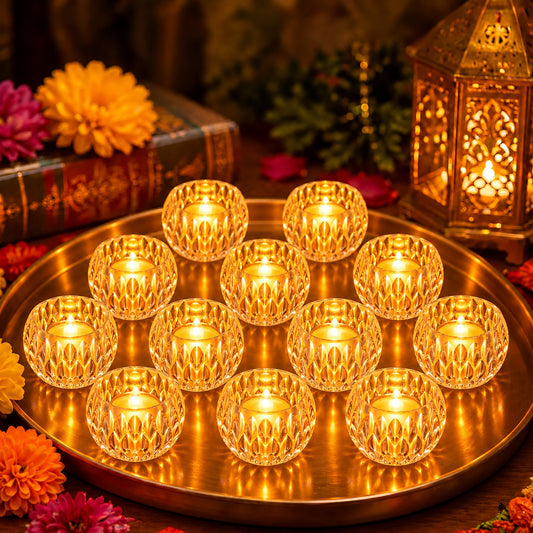 Twelve illuminated crystal-cut LED tea lights arranged on a golden tray with festive flowers and a lantern.