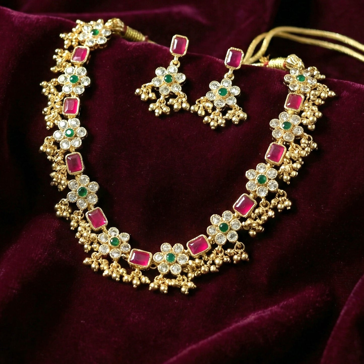 Full view of lotus floral multi-strand gold necklace set