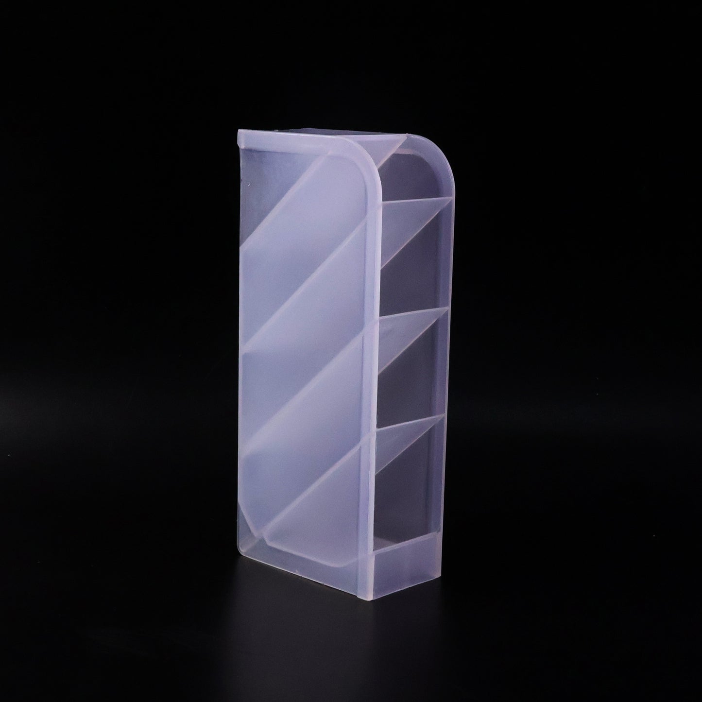 Close-up of plastic multi-storage holder compartments