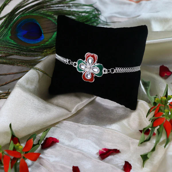 Floral design enamel Rakhi, a thoughtful gift for your brother on Raksha Bandhan.