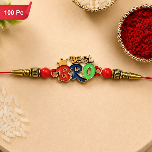 A red thread with a colorful "BEST BRO" charm, red beads, and golden accents, surrounded by rice and red powder in bowls.