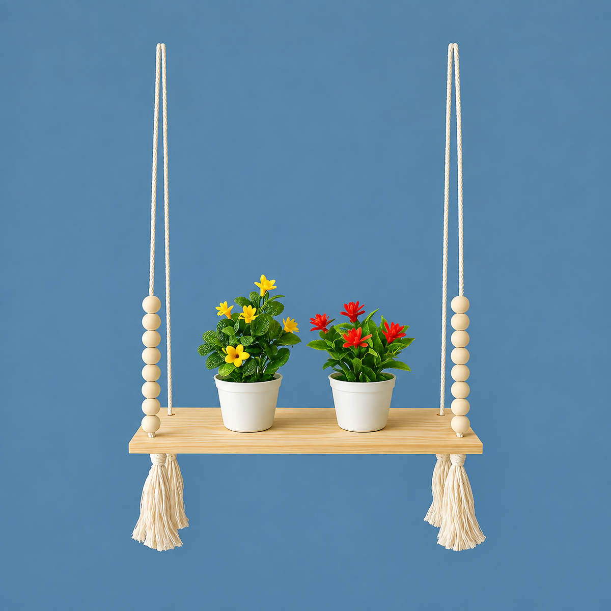 Wooden hanging shelf with two potted plants, beads, and tassels against a blue background.