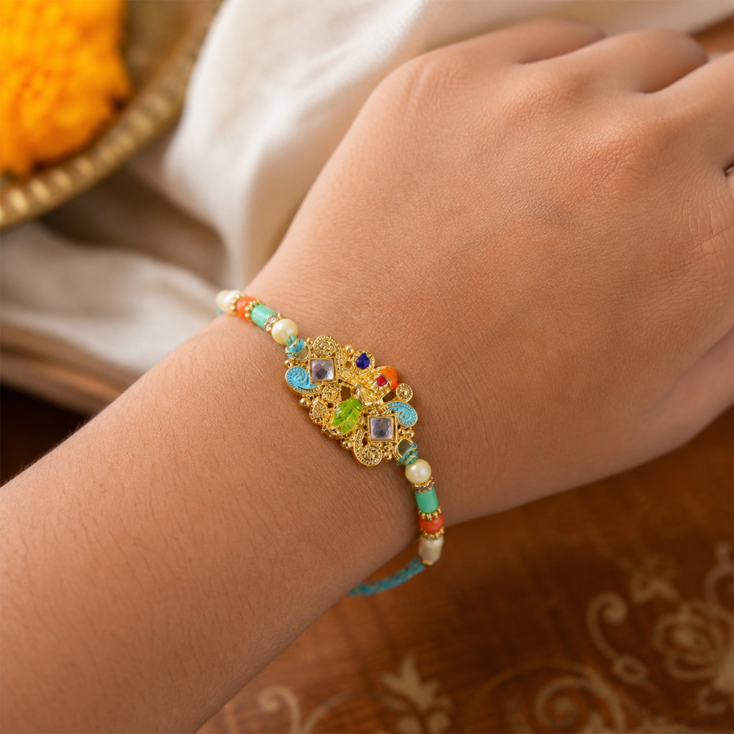 Oxidized Kundan Cluster Pendant Rakhi with Teal and Coral Beads