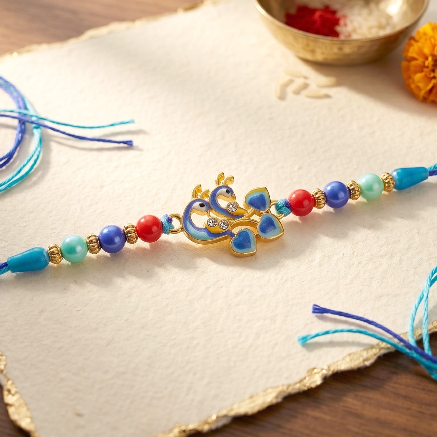 Twin Peacock Golden Enamel Designer Rakhi front view