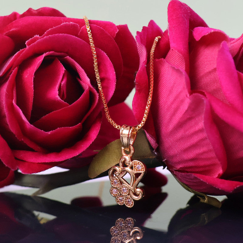 Side view of intricate floral heart pendant necklace with crystal adornments