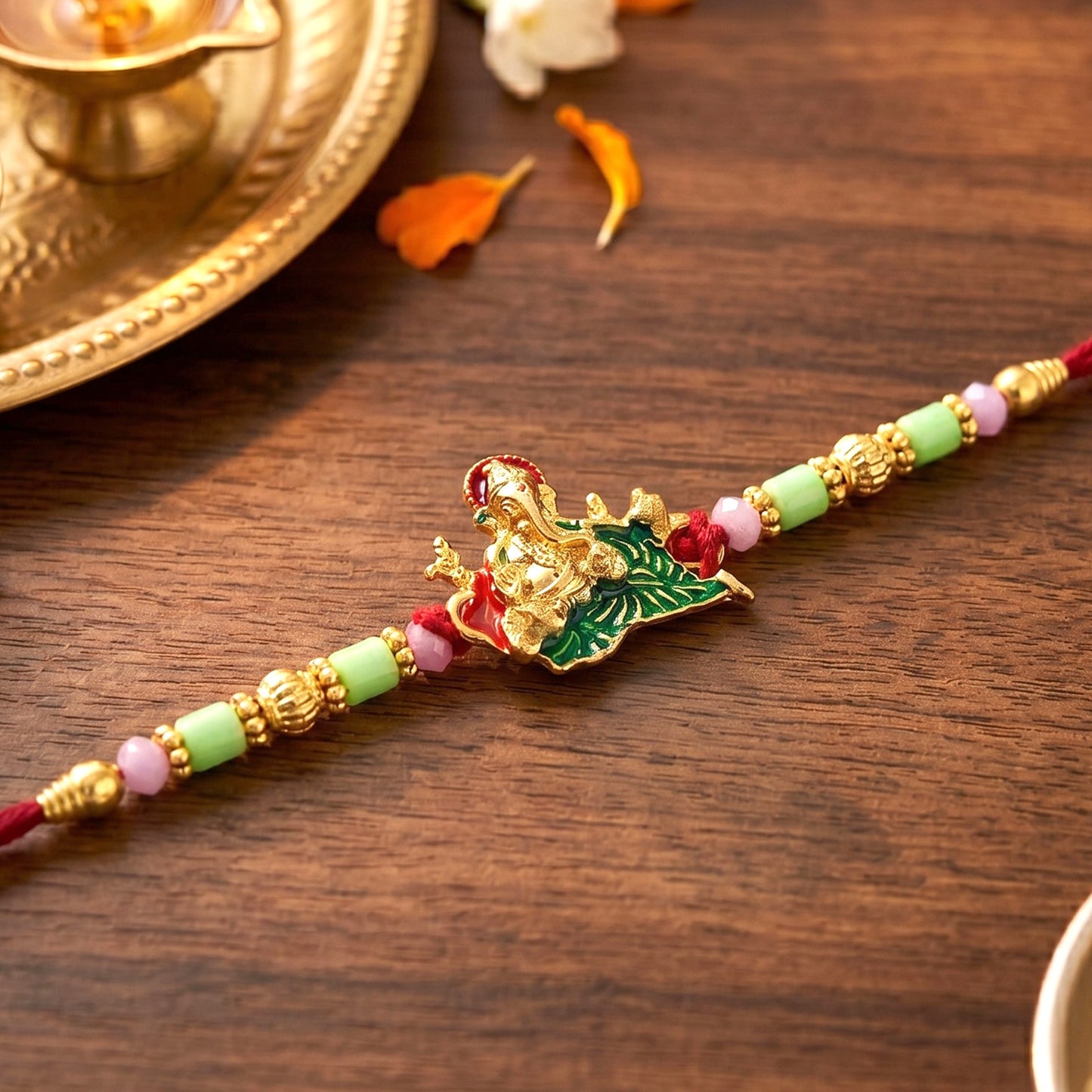 Lord Ganesha on Leaf Designer Rakhi