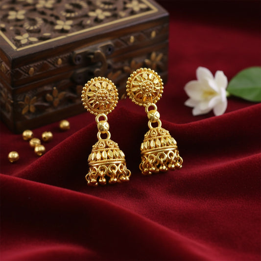 Gold plated traditional jhumka earrings with intricate design front view