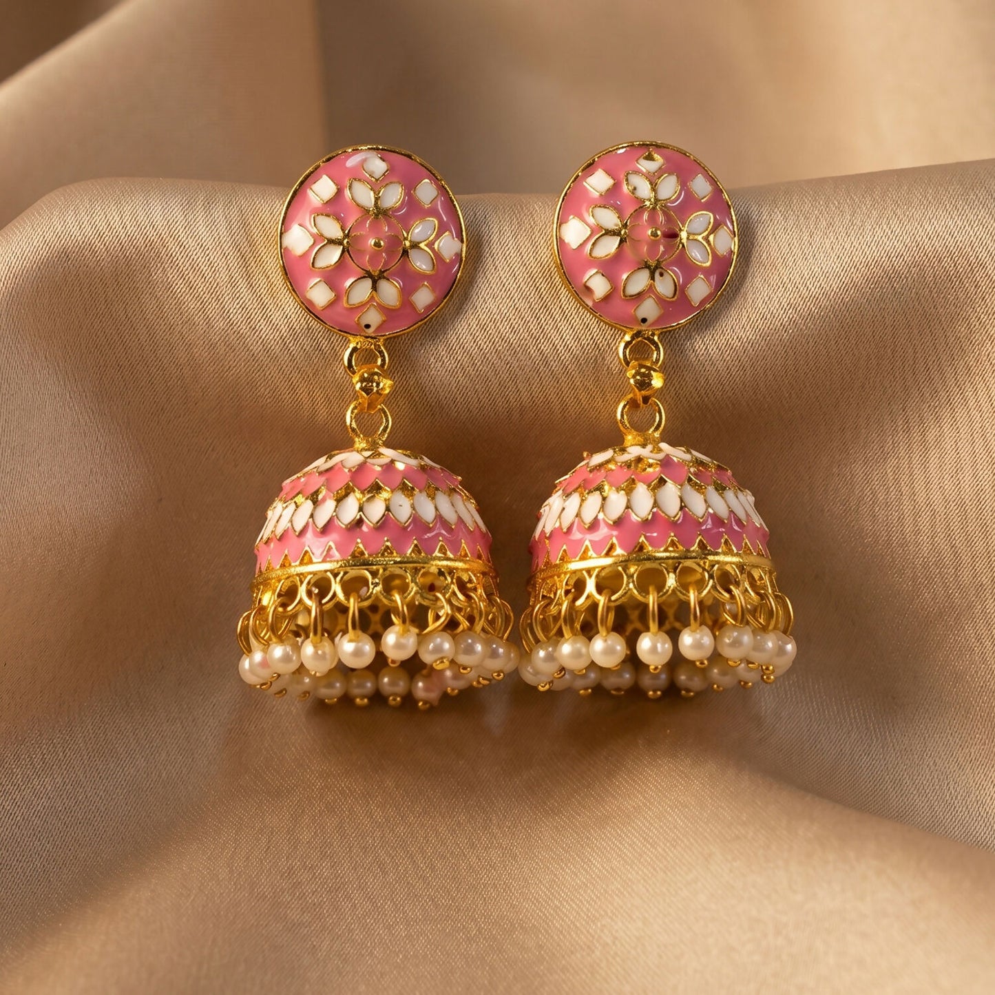 Pink jhumka earrings styled with festive attire