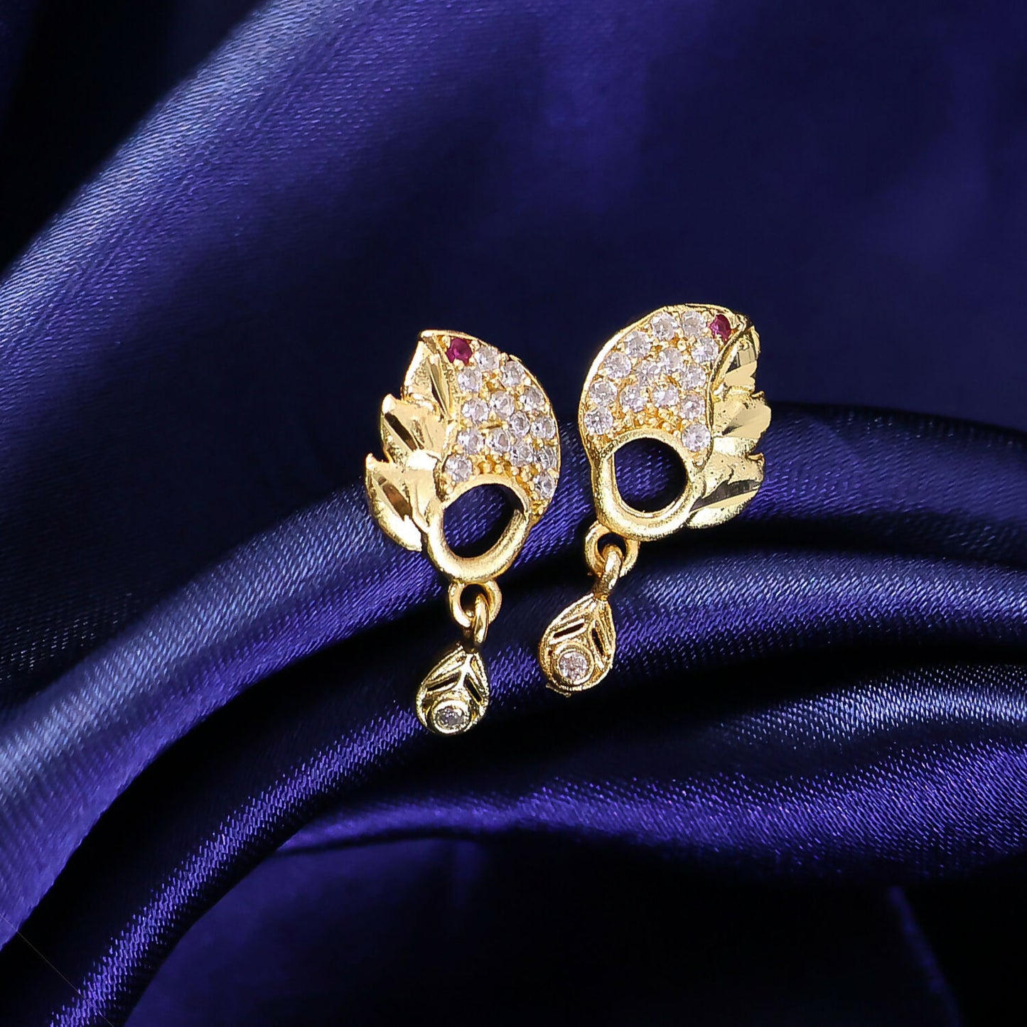 Elegant Gold Finish Leaf Pattern Stud Earrings With Sparkling Stone Drop Design