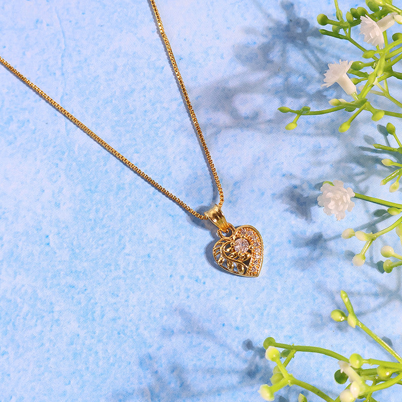 Elegant Crystal Heart Pendant Necklace with Artistic Leaf Detailing