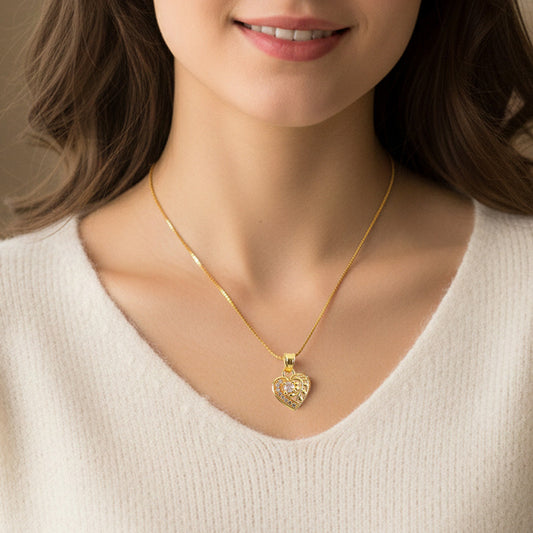 Elegant Crystal Heart Pendant Necklace with Artistic Leaf Detailing