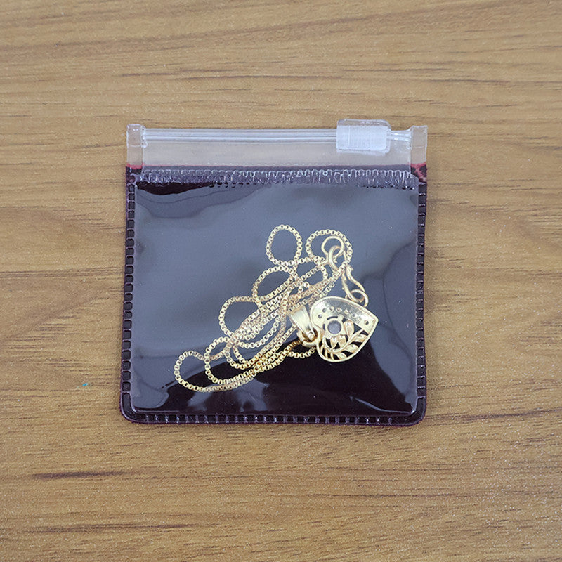 Elegant Crystal Heart Pendant Necklace with Artistic Leaf Detailing