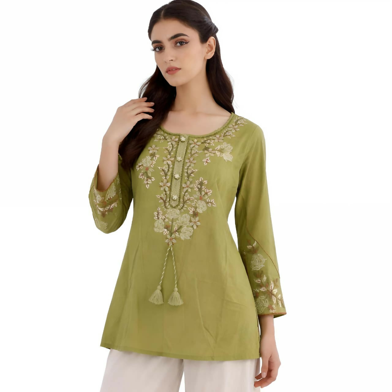 Close-up of floral embroidery and fabric texture on women's green kurta