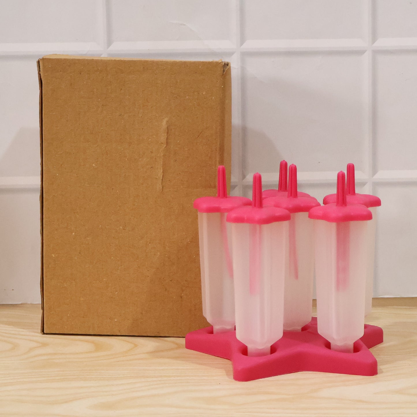 Plastic ice cream molds with sticks and lids