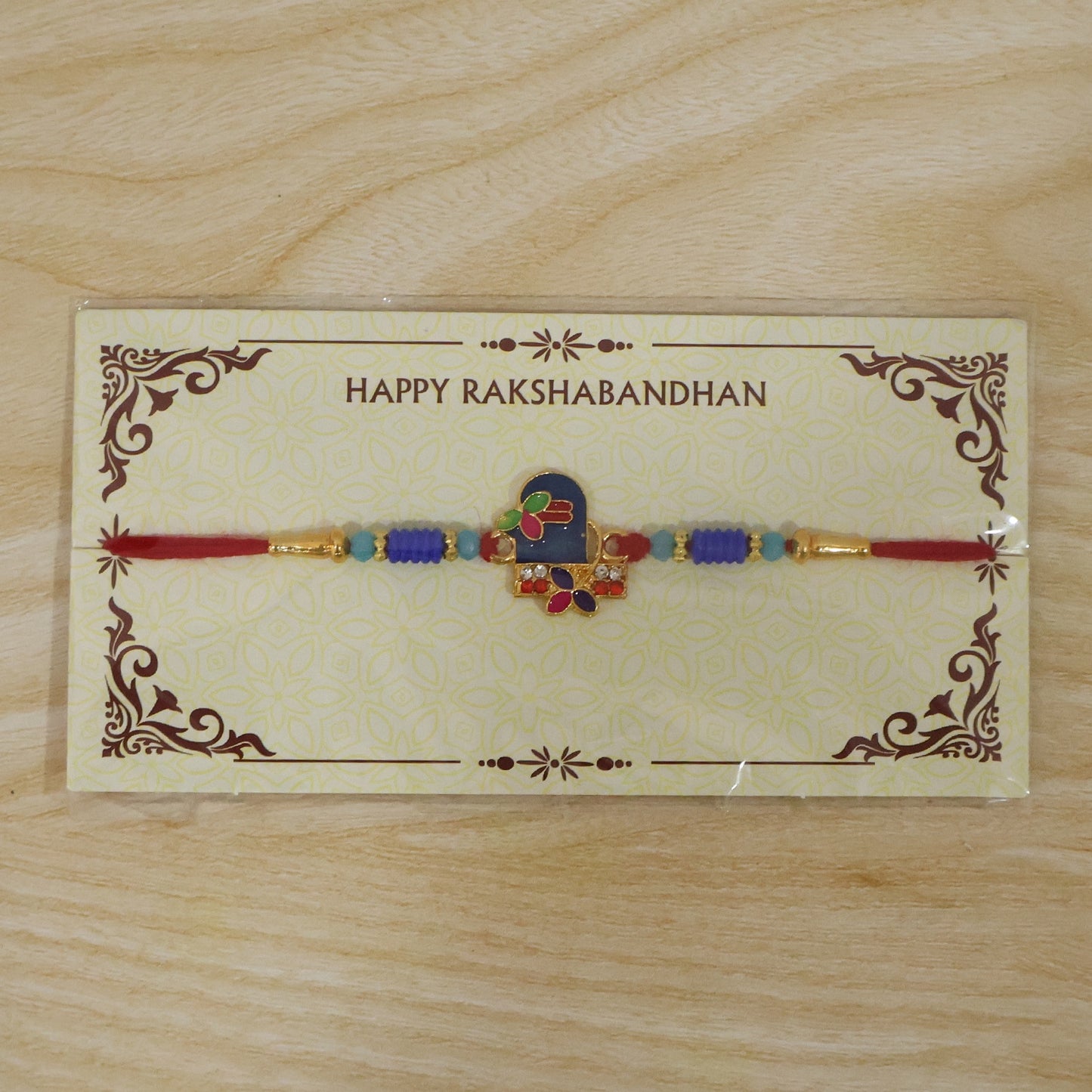 Traditional Royal Blue Shiv Rakhi with intricate design