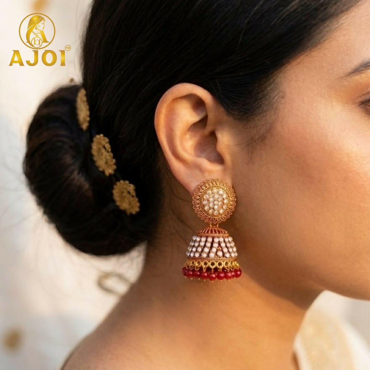 Elegant Gold-Plated Pearl Jhumka Earrings with Red Bead Drops