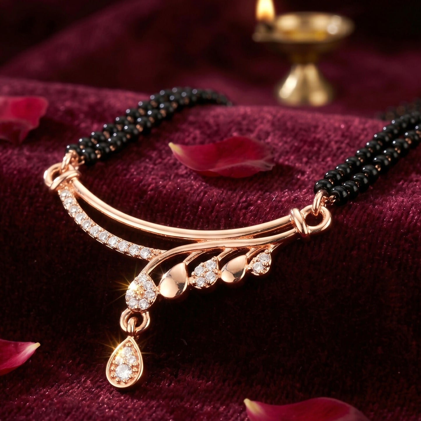 Beautiful rose gold mangalsutra with black bead chain and pear-shaped CZ drop detail