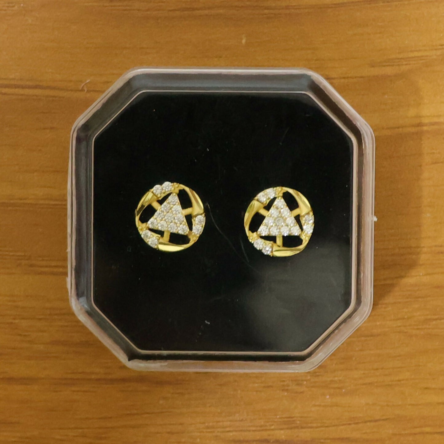 Premium gold jewelry earrings with bell shape and sparkling accents