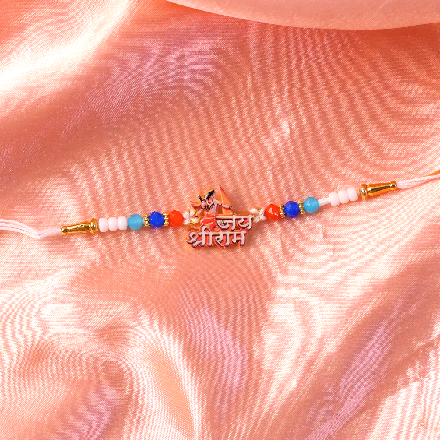 Side view of designer rakhi with beads