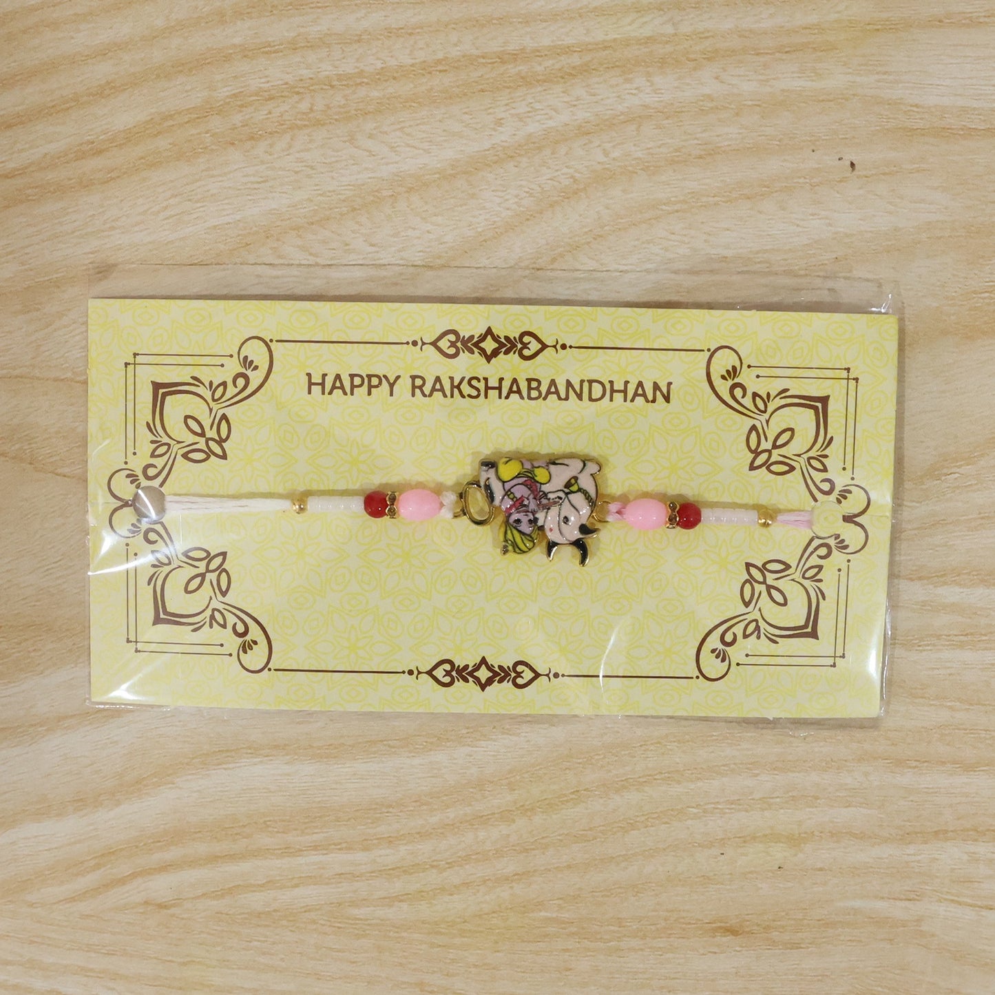 Festive Krishna cow designer Rakhi for Raksha Bandhan