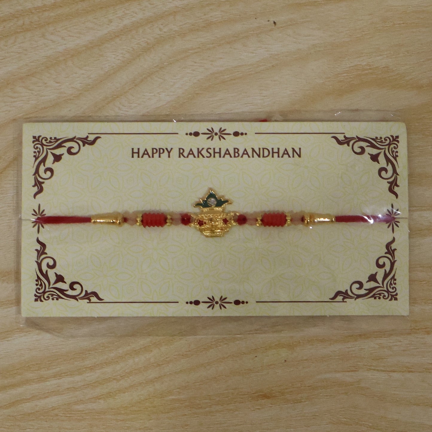 Sacred Kalash Designer Rakhi showcasing thread and beads
