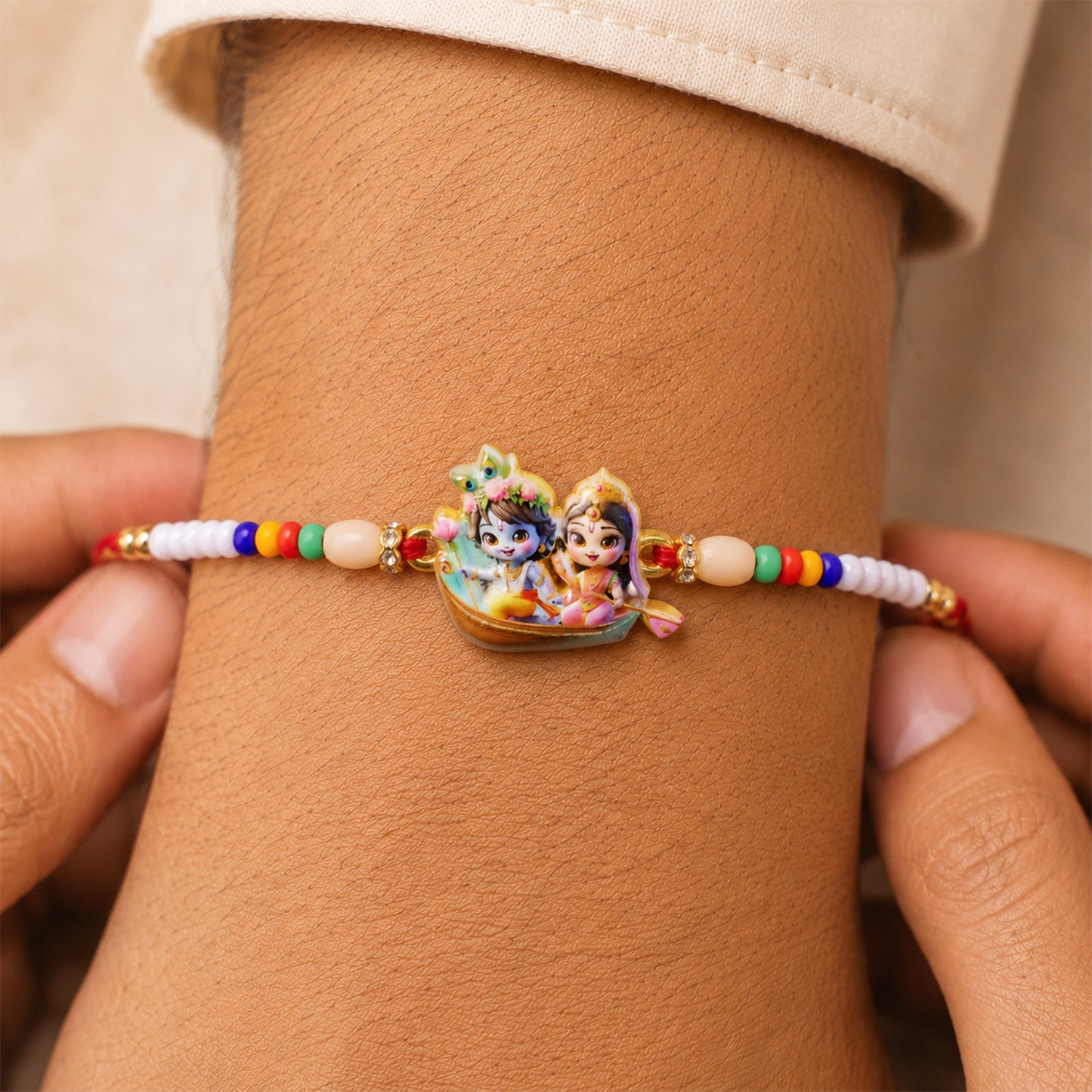 Krishna Radha Rakhi displayed with traditional thread and spiritual design.